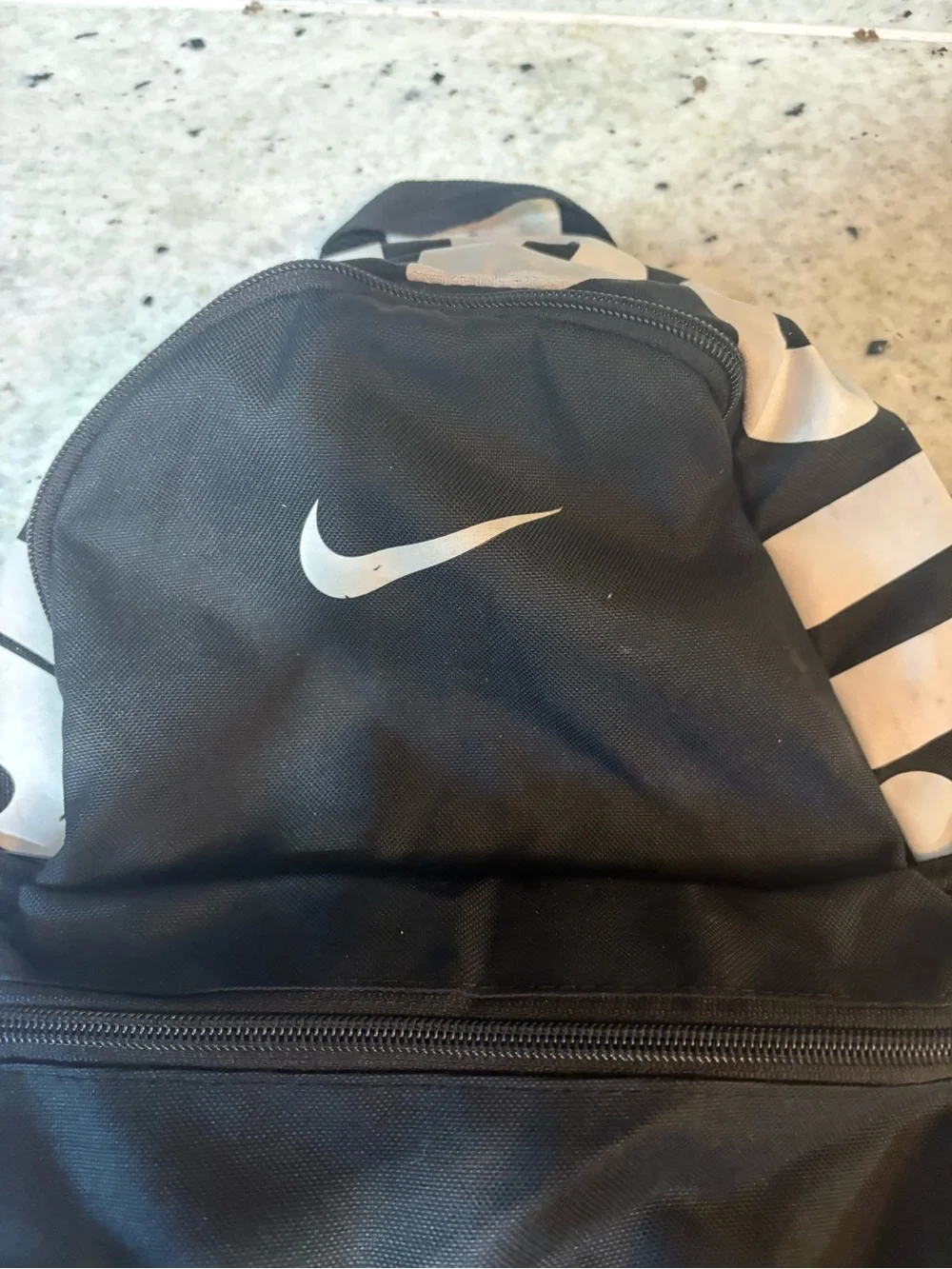 Nike Black and White Mini Backpack with Swoosh Accent